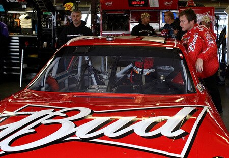 LOUDON, NH - SEPTEMBER 19:  Kasey Kahne, driver of the #9 Budweiser Dodge, climbs into his car during practice for the NASCAR Sprint Cup Series Sylvania 300 at the New Hampshire Motor Speedway on September 19, 2009 in Loudon, New Hampshire  <br /><br /><span class="help">(Photo by Jim McIsaac/Getty Images for NASCAR)</span>