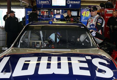 LOUDON, NH - SEPTEMBER 19:  Jimmie Johnson, driver of the #48 Lowe's Chevrolet, climbs into his car during practice for the NASCAR Sprint Cup Series Sylvania 300 at the New Hampshire Motor Speedway on September 19, 2009 in Loudon, New Hampshire  <br /><br /><span class="help">(Photo by Jim McIsaac/Getty Images for NASCAR)</span>
