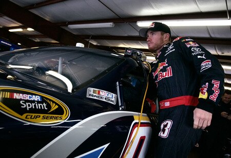 LOUDON, NH - SEPTEMBER 19:  Brian Vickers prepares to climb aboard the #83 Red Bull Toyota prior to practice for the NASCAR Sprint Cup Series Sylvania 300 at the New Hampshire Motor Speedway on September 19, 2009 in Loudon, New Hampshire  <br /><br /><span class="help">(Photo by Jason Smith/Getty Images for NASCAR)</span>