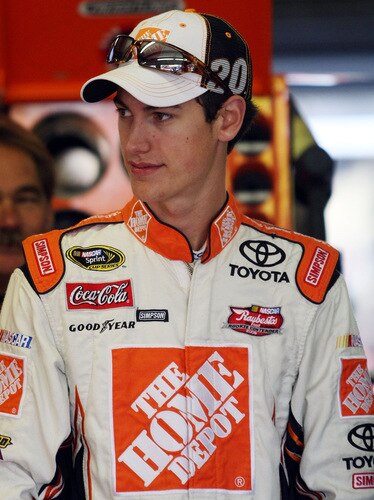 LOUDON, NH - SEPTEMBER 19:  Joe Logano, driver of the #20 The Home Depot Toyota, walks in the garage during practice for the NASCAR Sprint Cup Series Sylvania 300 at the New Hampshire Motor Speedway on September 19, 2009 in Loudon, New Hampshire  <br /><br /><span class="help">(Photo by Elsa/Getty Images for NASCAR)</span>