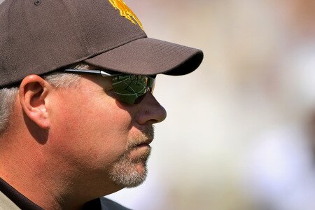 BOULDER, CO - SEPTEMBER 19:  Head coach Dave Christensen of the Wyoming Cowboys prepares to lead his team against the Colorado Buffaloes at Folsom Field on September 19, 2009 in Boulder, Colorado.  <br /><br /><span class="help">(Photo by Doug Pensinger/Getty Images)</span>