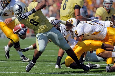 BOULDER, CO - SEPTEMBER 19:  Tailback Demetrius Sumler #8 of the Colorado Buffaloes fumbles the ball which was recovered by teammate Scotty McKnight to score a first quarter touchdown against the Wyoming Cowboys at Folsom Field on September 19, 2009 in Boulder, Colorado.  <br /><br /><span class="help">(Photo by Doug Pensinger/Getty Images)</span>