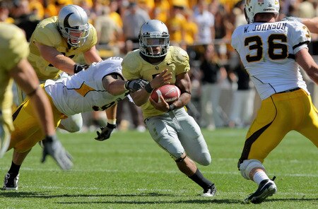 BOULDER, CO - SEPTEMBER 19:  Running back Rodney Stewart #5 of the Colorado Buffaloes picks up yardage as he breaks a tackle by John Fletcher #91 of the Wyoming Cowboys at Folsom Field on September 19, 2009 in Boulder, Colorado.  <br /><br /><span class="help">(Photo by Doug Pensinger/Getty Images)</span>