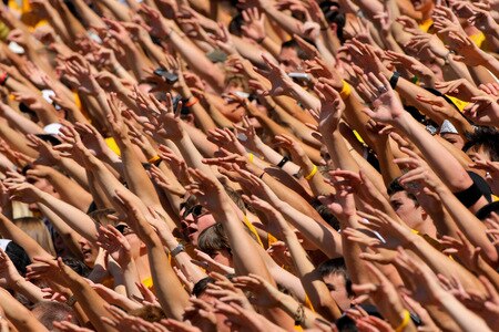 BOULDER, CO - SEPTEMBER 19:  Fans in the student section of the Colorado Buffaloes wave on the opening kick off against the Wyoming Cowboys at Folsom Field on September 19, 2009 in Boulder, Colorado.  <br /><br /><span class="help">(Photo by Doug Pensinger/Getty Images)</span>