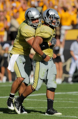 BOULDER, CO - SEPTEMBER 19:  Running back Rodney Stewart #5 of the Colorado Buffaloes celebrates his third quarter touchdown with teammate Scotty McKnight #21 (L) against the Wyoming Cowboys at Folsom Field on September 19, 2009 in Boulder, Colorado. Stewart's third quarter touchdown gave the Buffaloes a 24-0 lead over the Cowboys.  <br /><br /><span class="help">(Photo by Doug Pensinger/Getty Images)</span>