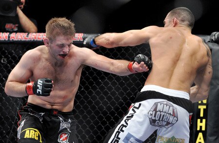 DALLAS - SEPTEMBER 19:  UFC fighter Nik Lentz (L) battles UFC fighter Rafaello Oliveira during their Lightweight bout at UFC 103: Franklin vs. Belfort at the American Airlines Center on September 19, 2009 in Dallas, Texas.  <br /><br /><span class="help">(Photo by Jon Kopaloff/Getty Images)</span>