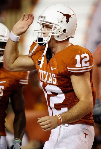 AUSTIN, TX - SEPTEMBER 19:  Quarterback Colt McCoy #12 of the Texas Longhorns celebrates a touchdown against the Texas Tech Red Raiders at Darrell K Royal-Texas Memorial Stadium on September 19, 2009 in Austin, Texas.  <br /><br /><span class="help">(Photo by Ronald Martinez/Getty Images)</span>