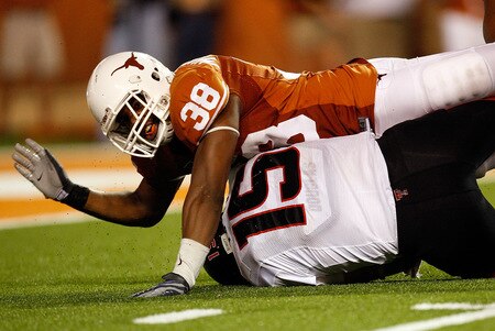 AUSTIN, TX - SEPTEMBER 19:  Quarterback Taylor Potts #15 of the Texas Tech Red Raiders is sacked by Roddrick Muckelroy #38 of the Texas Longhorns at Darrell K Royal-Texas Memorial Stadium on September 19, 2009 in Austin, Texas.  <br /><br /><span class="help">(Photo by Ronald Martinez/Getty Images)</span>