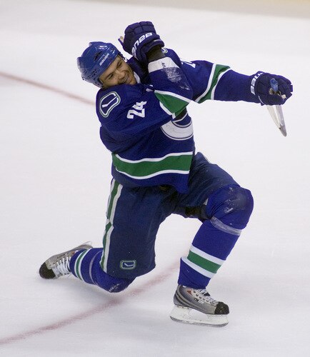 VANCOUVER, CANADA - SEPTEMBER 19:  Darcy Hordichuk #24 of the Vancouver Canucks celebrates after scoring against the Edmonton Oilers during the third period of NHL preseason action on September 19, 2009 at General Motors Place in Vancouver, British Columbia, Canada.  <br /><br /><span class="help">(Photo by Rich Lam/Getty Images)</span>