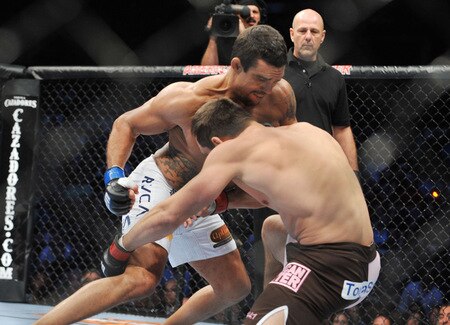 DALLAS - SEPTEMBER 19:  UFC fighter Vitor Belfort  (L) battles UFC fighter Rich Franklin (R) during their Catch weight bout at UFC 103: Franklin vs. Belfort at the American Airlines Center on September 19, 2009 in Dallas, Texas.  <br /><br /><span class="help">(Photo by Jon Kopaloff/Getty Images)</span>