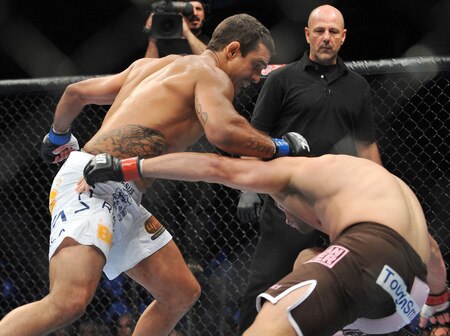 DALLAS - SEPTEMBER 19:  UFC fighter Vitor Belfort  (L) battles UFC fighter Rich Franklin (R) during their Catch weight bout at UFC 103: Franklin vs. Belfort at the American Airlines Center on September 19, 2009 in Dallas, Texas.  <br /><br /><span class="help">(Photo by Jon Kopaloff/Getty Images)</span>