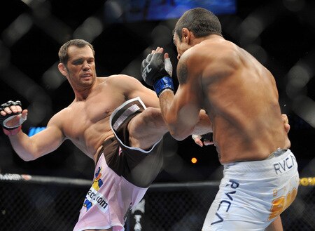 DALLAS - SEPTEMBER 19:  UFC fighter Vitor Belfort (R) battles UFC fighter Rich Franklin (L) during their Catch weight bout at UFC 103: Franklin vs. Belfort at the American Airlines Center on September 19, 2009 in Dallas, Texas.  <br /><br /><span class="help">(Photo by Jon Kopaloff/Getty Images)</span>