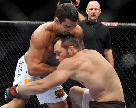 DALLAS - SEPTEMBER 19:  UFC fighter Vitor Belfort  (L) battles UFC fighter Rich Franklin (R) during their Catch weight bout at UFC 103: Franklin vs. Belfort at the American Airlines Center on September 19, 2009 in Dallas, Texas.  <br /><br /><span class="help">(Photo by Jon Kopaloff/Getty Images)</span>