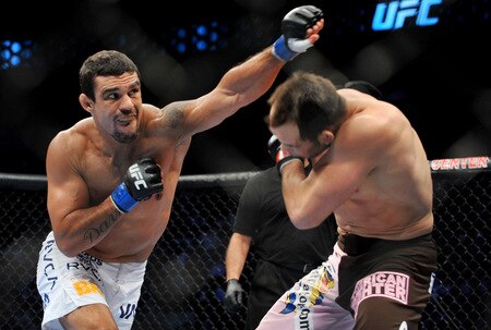 DALLAS - SEPTEMBER 19:  UFC fighter Vitor Belfort  (L) battles UFC fighter Rich Franklin (R) during their Catch weight bout at UFC 103: Franklin vs. Belfort at the American Airlines Center on September 19, 2009 in Dallas, Texas.  <br /><br /><span class="help">(Photo by Jon Kopaloff/Getty Images)</span>