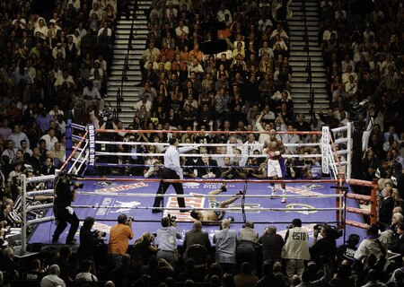 LAS VEGAS - SEPTEMBER 19:  Floyd Mayweather Jr. (R) knocks down Juan Manuel Marquez during the second round of their bout at the MGM Grand Garden Arena September 19, 2009 in Las Vegas, Nevada. Mayweather won by unanimous decision.  <br /><br /><span class="help">(Photo by Eric Jamison/Getty Images)</span>