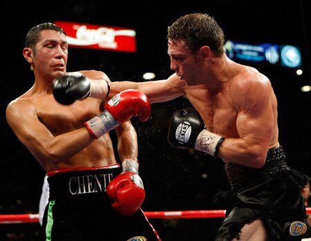 LAS VEGAS - SEPTEMBER 19:  Michael Katsidis (R) hits Vincent Escobedo in the sixth round of their WBO interim lightweight title fight at the MGM Grand Garden Arena September 19, 2009 in Las Vegas, Nevada. Katsidis won the title by split decision.  <br /><br /><span class="help">(Photo by Ethan Miller/Getty Images)</span>