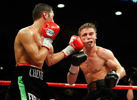LAS VEGAS - SEPTEMBER 19:  Vincent Escobedo (L) hits Michael Katsidis in the seventh round of their WBO interim lightweight title fight at the MGM Grand Garden Arena September 19, 2009 in Las Vegas, Nevada. Katsidis won the title by split decision.  <br /><br /><span class="help">(Photo by Ethan Miller/Getty Images)</span>