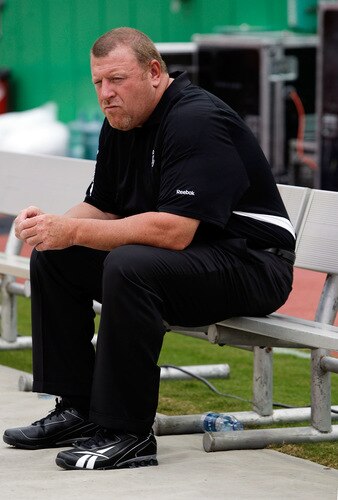 KANSAS CITY, MO - SEPTEMBER 20:  Head coach Tom Cable of the Oakland Raiders watches from the bench during warm-ups prior to the start of the game against the Kansas City Chiefs at Arrowhead Stadium on September 20, 2009 in Kansas City, Missouri.  <br /><br /><span class="help">(Photo by Jamie Squire/Getty Images)</span>