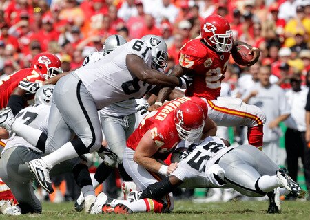KANSAS CITY, MO - SEPTEMBER 20:  Running back Larry Johnson #27 of the Kansas City Chiefs carries the ball upfield during the game against  the Oakland Raiders at Arrowhead Stadium on September 20, 2009 in Kansas City, Missouri.  <br /><br /><span class="help">(Photo by Jamie Squire/Getty Images)</span>