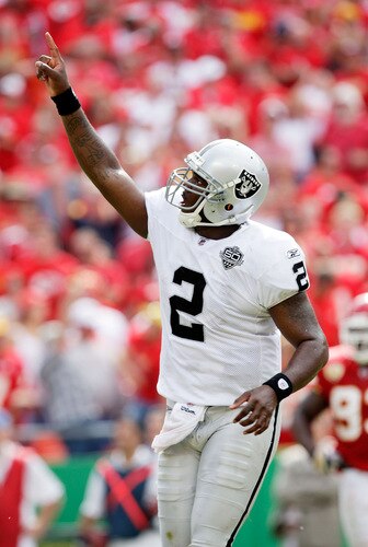 KANSAS CITY, MO - SEPTEMBER 20:  Quarterback JaMarcus Russell #2 of the Oakland Raiders celebrates after handing off for a touchdown in the final minutes of the 4th quarter during the Raiders' 13-10 victory over the Kansas City Chiefs during the game at Arrowhead Stadium on September 20, 2009 in Kansas City, Missouri.  <br /><br /><span class="help">(Photo by Jamie Squire/Getty Images)</span>