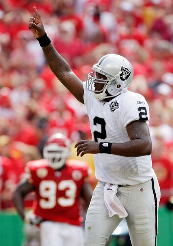 KANSAS CITY, MO - SEPTEMBER 20:  Quarterback JaMarcus Russell #2 of the Oakland Raiders celebrates after handing off for a touchdown in the final minutes of the 4th quarter during the Raiders' 13-10 victory over the Kansas City Chiefs during the game at Arrowhead Stadium on September 20, 2009 in Kansas City, Missouri.  <br /><br /><span class="help">(Photo by Jamie Squire/Getty Images)</span>