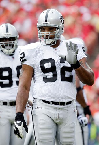 KANSAS CITY, MO - SEPTEMBER 20:  Defensive end Richard Seymour #92 of the Oakland Raiders gestures toward the sidelines during a timeout during the game against the Kansas City Chiefs at Arrowhead Stadium on September 20, 2009 in Kansas City, Missouri.  <br /><br /><span class="help">(Photo by Jamie Squire/Getty Images)</span>