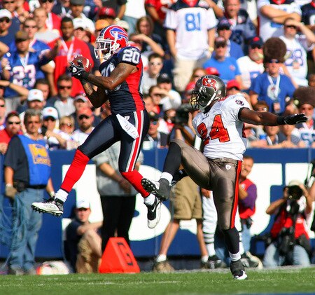 ORCHARD PARK, NY - SEPTEMBER 20: Donte Whitner #20  of the Buffalo Bills intercepts a pass intended for Carnell Williams #24 of the Tampa Bay Buccaneers at Ralph Wilson Stadium on September 20, 2009 in Orchard Park, New York.  <br /><br /><span class="help">(Photo by Rick Stewart/Getty Images)</span>