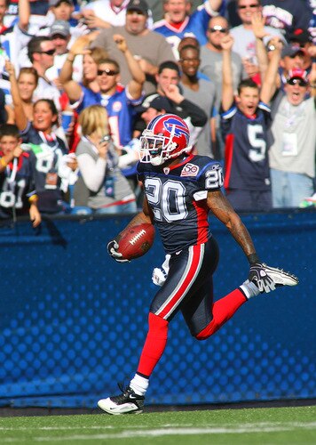 ORCHARD PARK, NY - SEPTEMBER 20:  Donte Whitner #20  of the Buffalo Bills returns an intercepted pass 76  yards for a touchdown against the Tampa Bay Buccaneers at Ralph Wilson Stadium on September 20, 2009 in Orchard Park, New York.  <br /><br /><span class="help">(Photo by Rick Stewart/Getty Images)</span>