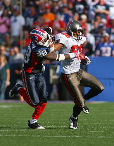 ORCHARD PARK, NY - SEPTEMBER 20: Michael Clayton #80 of the Tampa Bay Buccaneers tries to break free from Leodis McKelvin #28 of the Buffalo Bills at Ralph Wilson Stadium on September 20, 2009 in Orchard Park, New York.  <br /><br /><span class="help">(Photo by Rick Stewart/Getty Images)</span>