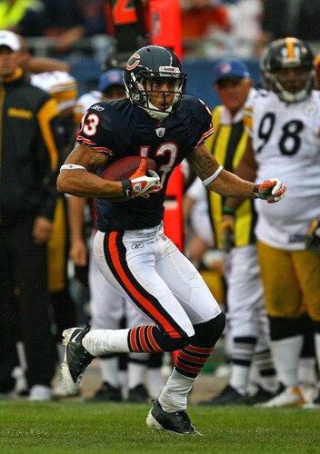 CHICAGO - SEPTEMBER 20: Johnny Knox #13 of the Chicago Bears runs for a first down after a catch against the Pittsburgh Steelers on September 20, 2009 at Soldier Field in Chicago, Illinois. The Bears defeated the Steelers 17-14. <br /><br /><span class="help">(Photo by Jonathan Daniel/Getty Images)</span>