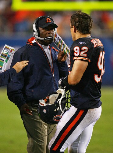 CHICAGO - SEPTEMBER 20: Head coach Lovie Smith of the Chicago Bears gives instructions to Hunter Hillenmeyer #92 during a game against the Pittsburgh Steelers on September 20, 2009 at Soldier Field in Chicago, Illinois. The Bears defeated the Steelers 17-14. <br /><br /><span class="help">(Photo by Jonathan Daniel/Getty Images)</span>