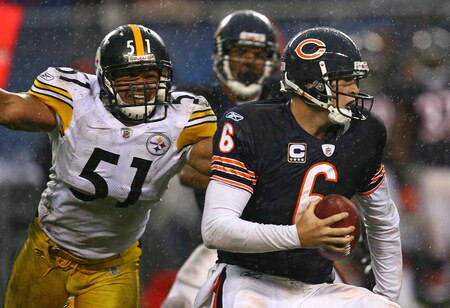 CHICAGO - SEPTEMBER 20: Jay Cutler #6 of the Chicago Bears avoids pressure from James Farrior #51 of the Pittsburgh Steelers as he looks for a receiver on September 20, 2009 at Soldier Field in Chicago, Illinois. The Bears defeated the Steelers 17-14. <br /><br /><span class="help">(Photo by Jonathan Daniel/Getty Images)</span>