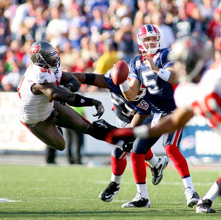 ORCHARD PARK, NY - SEPTEMBER 20:  Trent Edwards #5 of the Buffalo Bills is pressured by Stylez G. White #91 of the Tampa Bay Buccaneers at Ralph Wilson Stadium on September 20, 2009 in Orchard Park, New York. Buffalo won 33-20.  <br /><br /><span class="help">(Photo by Rick Stewart/Getty Images)</span>