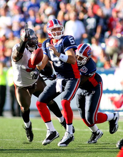 ORCHARD PARK, NY - SEPTEMBER 20:  Trent Edwards #5 of the Buffalo Bills is pressured by Stylez G. White #91 of the Tampa Bay Buccaneers at Ralph Wilson Stadium on September 20, 2009 in Orchard Park, New York. Buffalo won 33-20.  <br /><br /><span class="help">(Photo by Rick Stewart/Getty Images)</span>
