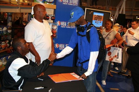 NEW YORK - SEPTEMBER 21:  Chris Paul of the New Orleans Hornets shakes hands with a fan as he does a signing of his book titled "Long Shot: Never Too Small to Dream Big" at the NBA Store on September 21, 2009 in New York CIty.<br /><br /><span class="help">(Photo by Brian Choi/NBAE via Getty Images)</span>