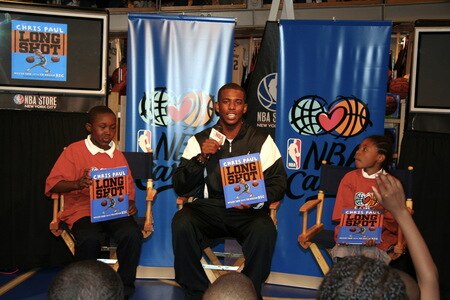 NEW YORK - SEPTEMBER 21:  Chris Paul of the New Orleans Hornets does a reading his book titled "Long Shot: Never Too Small to Dream Big" at the NBA Store on September 21, 2009 in New York CIty. <br /><br /><span class="help">(Photo by Brian Choi/NBAE via Getty Images)</span>