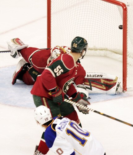 ST. PAUL, MN - SEPTEMBER 24:  Andy McDonald #10 scores against Nick Schultz #55 and goalie Niklas Backstrom of the Minnesota Wild at the Xcel Energy Center on September 24, 2009 in St. Paul, Minnesota. The Blues defeated the Wild 4-1.<br /><br /><span class="help">(Photo by Genevieve Ross/Getty Images)</span>