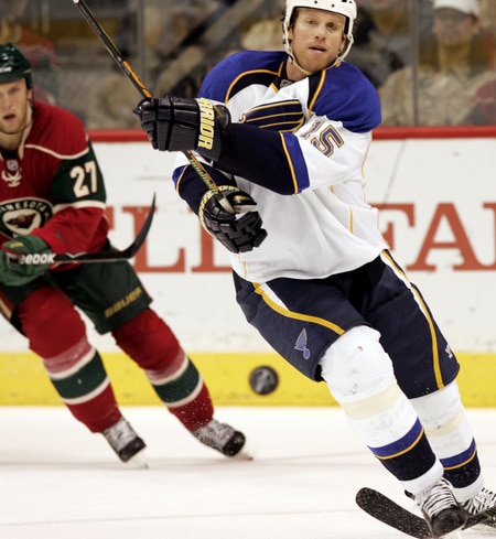 ST. PAUL, MN - SEPTEMBER 24:  Brad Winchester #15 of the St. Louis Blues passes the puck against the Minnesota Wild in the third period at the Xcel Energy Center on September 24, 2009 in St. Paul, Minnesota. The Blues defeated the Wild 4-1. <br /><br /><span class="help">(Photo by Genevieve Ross/Getty Images)</span>