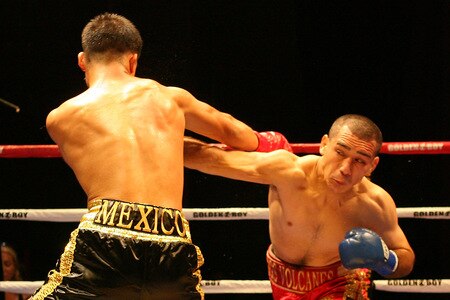 LOS ANGELES, CA - SEPTEMBER 24:  Cristian Favela throws a left hook against Louis Ramos Jr. in the main event at the Nokia Center  on September 24, 2009 in Los Angeles, California.  <br /><br /><span class="help">(Photo by Jacob de Golish/Getty Images)</span>