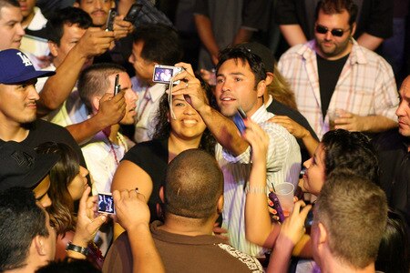 LOS ANGELES, CA - SEPTEMBER 24:  Oscar De LaHoya takes photos with fans during Fight Night Club Nokia and the Nokia Center on September 24, 2009 in Los Angeles, California.  <br /><br /><span class="help">(Photo by Jacob de Golish/Getty Images)</span>