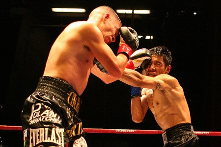 LOS ANGELES, CA - SEPTEMBER 24:  Charles Huerta exchanges punches with opponent Rodrigo Aranda at the Nokia Center on September 24, 2009 in Los Angeles, California. Huerta defeated Aranda  <br /><br /><span class="help">(Photo by Jacob de Golish/Getty Images)</span>