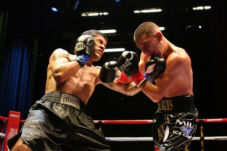 LOS ANGELES, CA - SEPTEMBER 24: Rodrigo Aranda throws a left uppercut  against opponent Charles Huerta at the Nokia Center on September 24, 2009 in Los Angeles, California.  <br /><br /><span class="help">(Photo by Jacob de Golish/Getty Images)</span>