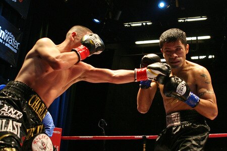 LOS ANGELES, CA - SEPTEMBER 24: Charles Huerta throws a left hand against opponent Rodrigo Aranda at the Nokia Center on September 24, 2009 in Los Angeles, California.  <br /><br /><span class="help">(Photo by Jacob de Golish/Getty Images)</span>