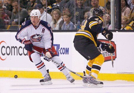 BOSTON, MA - SEPTEMBER 26: Matt Hunwick #48 of the Boston Bruins loses the puck to Raffi Torres #14 of the Columbus Blue Jackets during a preseason game at the TD Banknorth Garden on September 26, 2009 in Boston, Massachusetts.<br /><br /><span class="help">(Photo by Jim Rogash/Getty Images)</span>