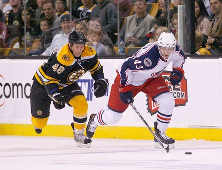 BOSTON, MA - SEPTEMBER 26: David Hunwick #48 of the Boston Bruins chases Maksim Mayorov #43 of the Columbus Blue Jackets during preseason play at the TD Banknorth Garden on September 26, 2009 in Boston, Massachusetts.<br /><br /><span class="help">(Photo by Jim Rogash/Getty Images)</span>