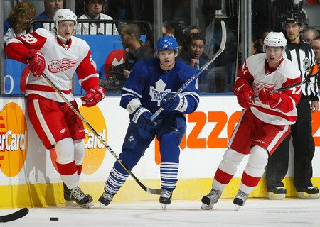 TORONTO, ON - SEPTEMBER 26:  Garnet Exelby #3 of the Toronto Maple Leafs clears the puck away skates in a pre-season game against the Detroit Red Wings on September 26, 2009 at the Air Canada Centre in Toronto, Ontario. The Leafs defeated the Red Wings 2-1. <br /><br /><span class="help">(Photo by Claus Andersen/Getty Images)</span>