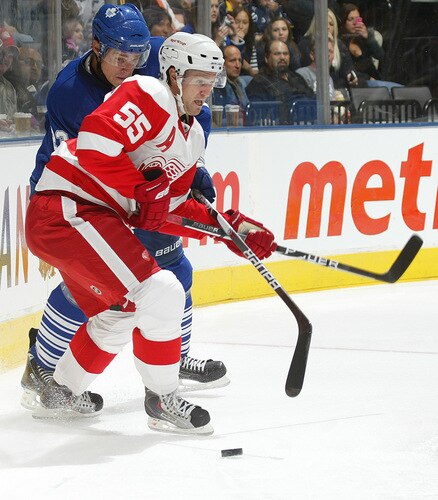TORONTO, ON - SEPTEMBER 26:  Niklas Kronwall #55 of the Detroit Red Wings keeps the puck away from Alexei Ponikarovsky #23 of the Toronto Maple Leafs in a pre-season game on September 26, 2009 at the Air Canada Centre in Toronto, Ontario. The Leafs defeated the Red Wings 2-1. <br /><br /><span class="help">(Photo by Claus Andersen/Getty Images)</span>