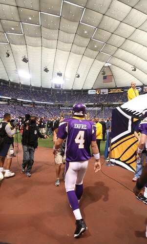 MINNEAPOLIS - SEPTEMBER 27: Brett Favre #4 of the Minnesota Vikings walks on to the field for warm-ups before his first regular season home game against the San Francisco 49ers at the Hubert H. Humphrey Metrodome on September 27, 2009 in Minneapolis, Minnesota. <br /><br /><span class="help">(Photo by Jonathan Daniel/Getty Images)</span>