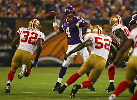 MINNEAPOLIS - SEPTEMBER 27: Brett Favre #4 of the Minnesota Vikings throws a pass while being rushed by (L-R) Michael Lewis #32, Patrick Willis #52 and Parys Haralson #98 of the San Francisco 49ers at the Hubert H. Humphrey Metrodome on September 27, 2009 in Minneapolis, Minnesota. The Vikings defeated the 49ers 27-24. <br /><br /><span class="help">(Photo by Jonathan Daniel/Getty Images)</span>