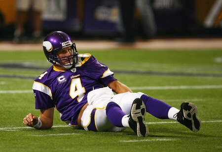 MINNEAPOLIS - SEPTEMBER 27: Brett Favre #4 of the Minnesota Vikings lies on the ground after being hit while passing the ball against the San Francisco 49ers at the Hubert H. Humphrey Metrodome on September 27, 2009 in Minneapolis, Minnesota. The Vikings defeated the 49ers 27-24. <br /><br /><span class="help">(Photo by Jonathan Daniel/Getty Images)</span>